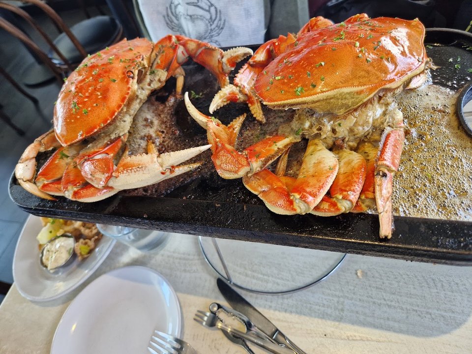 Dine-in tables with Monterey Bay views beyond.